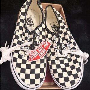 Vans Black and White Checkerboard Slip-Ons